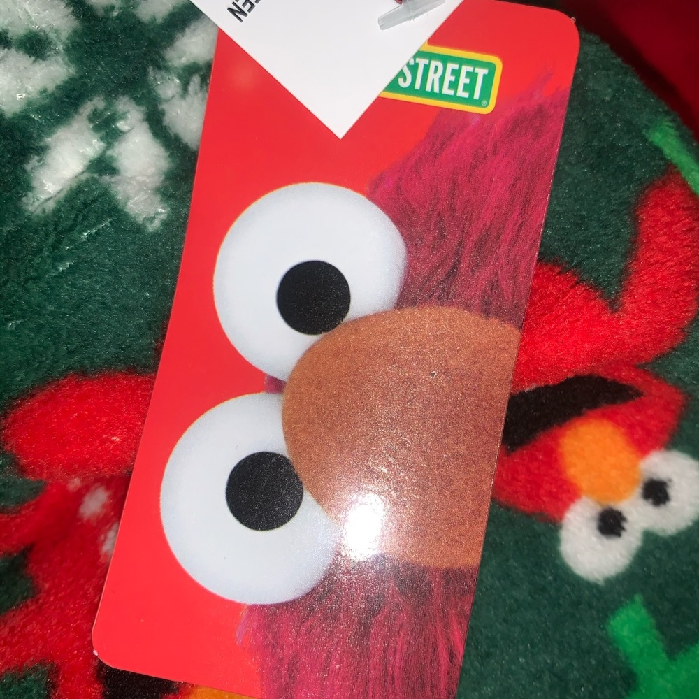 Brand new women’s size large Elmo fleece pajama pants. - Picture 6 of 7